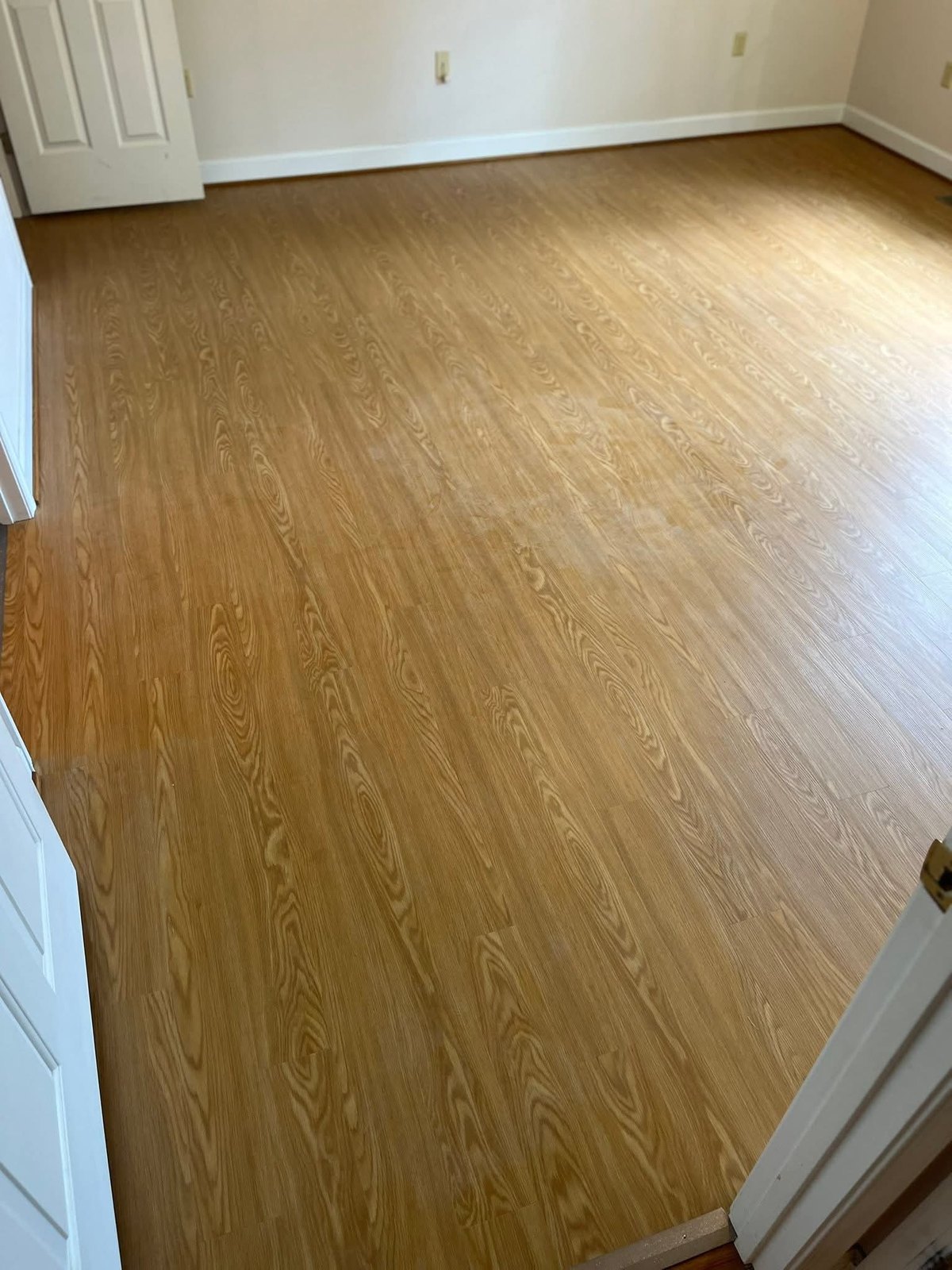 Hard-surface flooring installation in a room