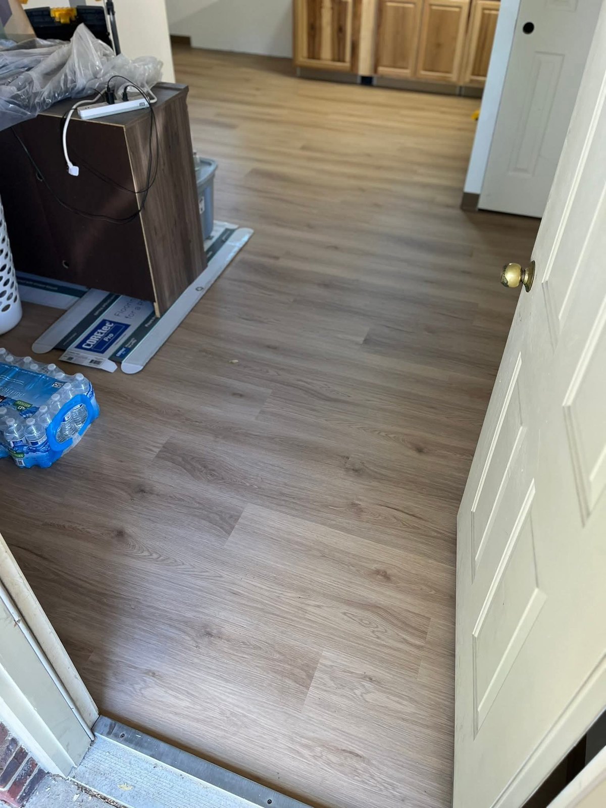 Light wood-look flooring in a hallway